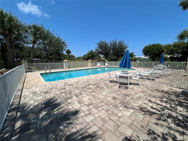 3 Largo Way, Boynton Beach, FL 33426 - community pool featuring a patio area