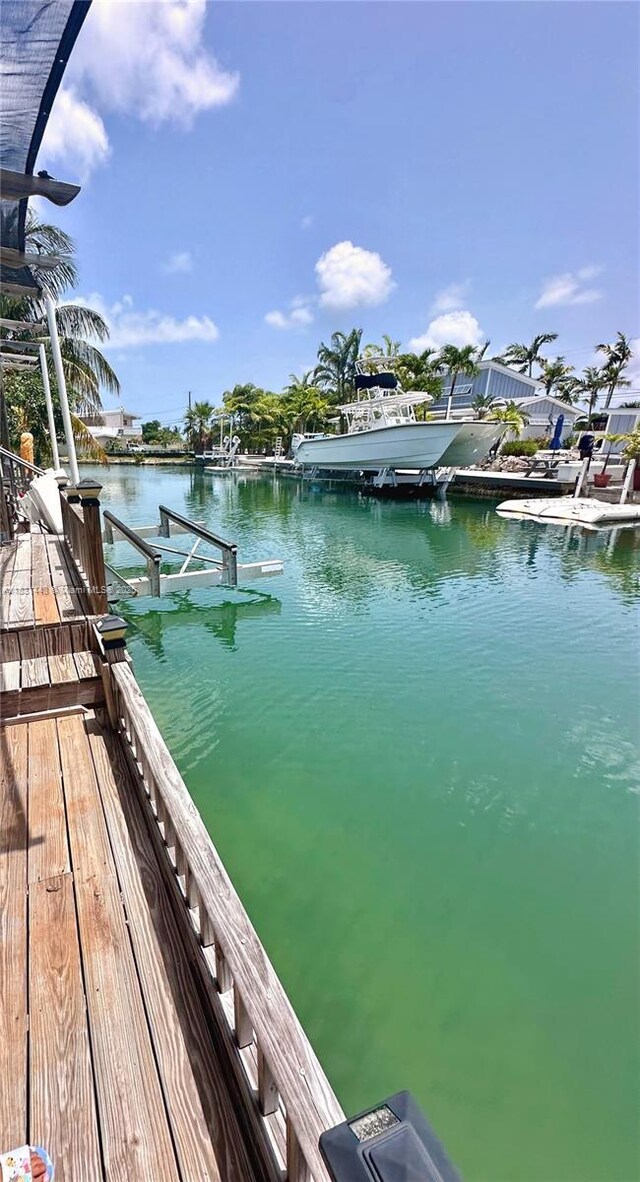 715 E Caribbean Dr E, Lower Keys, FL 33042 - dock featuring a water view