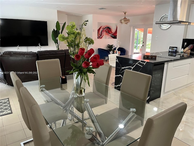 1014 W 68th St, Hialeah, FL 33014 - dining room featuring wine cooler and french doors