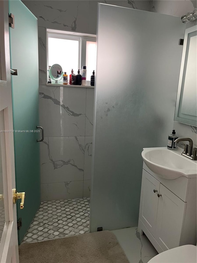1014 W 68th St, Hialeah, FL 33014 - bathroom with vanity and a marble finish shower