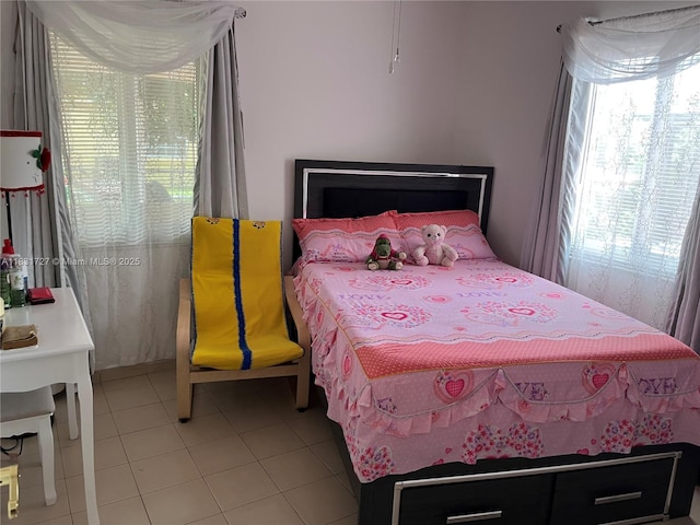 1014 W 68th St, Hialeah, FL 33014 - bedroom featuring light tile patterned flooring