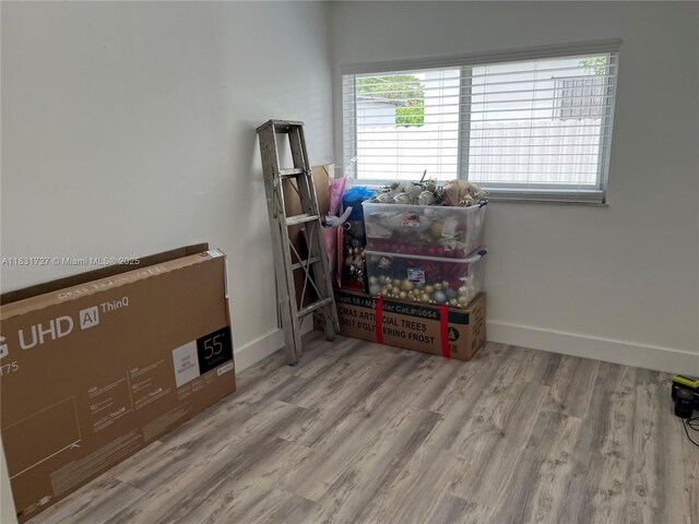1014 W 68th St, Hialeah, FL 33014 - misc room with wood finished floors and baseboards