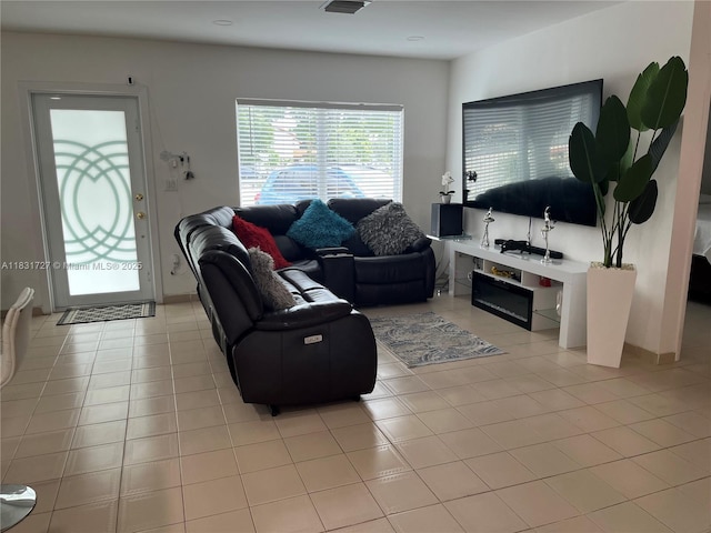 1014 W 68th St, Hialeah, FL 33014 - living area featuring light tile patterned floors