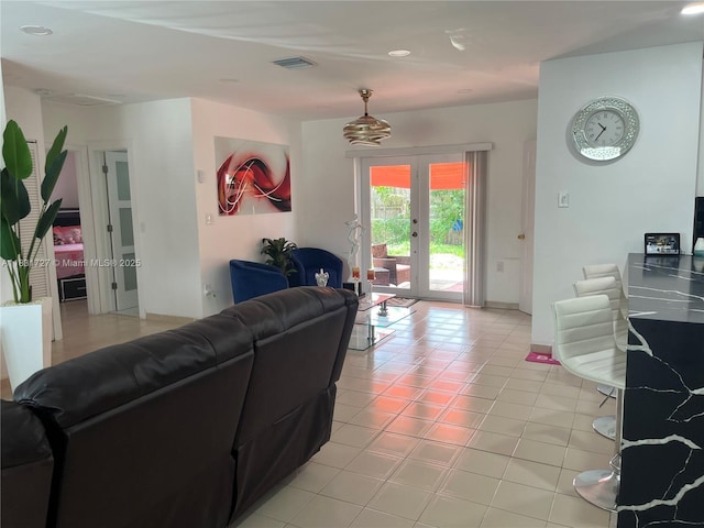 1014 W 68th St, Hialeah, FL 33014 - living room with recessed lighting and light tile patterned floors
