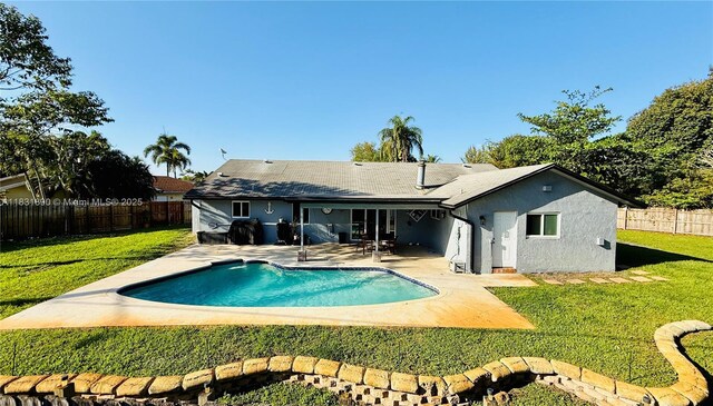 2980 SW 82nd Way, Davie, FL 33328 - rear view of property with a patio, a fenced backyard, and stucco siding