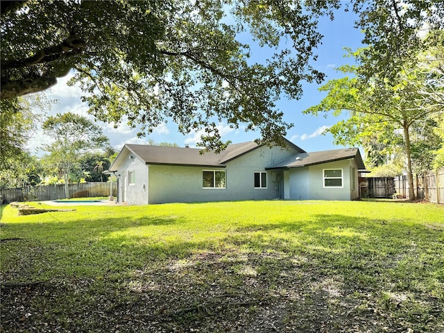 2980 SW 82nd Way, Davie, FL 33328 - rear view of property with a fenced backyard and stucco siding