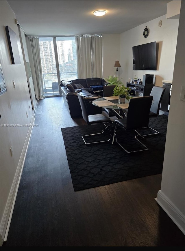 90 SW 3rd St Unit 2214, Miami, FL 33130 - dining area featuring wood finished floors and baseboards