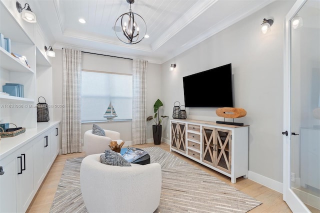 9369 Crestview Cir, Palm Beach Gardens, FL 33412 - living area featuring light wood finished floors, a tray ceiling, crown molding, a chandelier, and recessed lighting