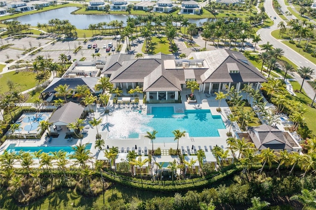 9369 Crestview Cir, Palm Beach Gardens, FL 33412 - aerial perspective of suburban area with a pool area and a large body of water