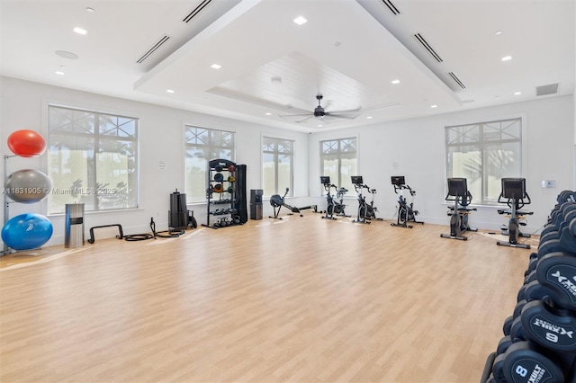 9369 Crestview Cir, Palm Beach Gardens, FL 33412 - exercise room with wood finished floors, a raised ceiling, recessed lighting, and ceiling fan