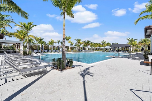 9369 Crestview Cir, Palm Beach Gardens, FL 33412 - community pool with a patio