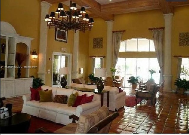 160 SW 117th Ter Unit 6102, Pembroke Pines, FL 33025 - building lobby with a towering ceiling and beamed ceiling
