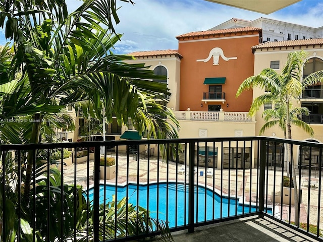 55 Merrick Way Unit 711, Coral Gables, FL 33134 - community pool featuring a patio