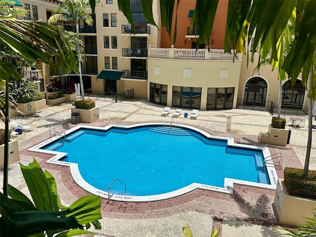 55 Merrick Way Unit 711, Coral Gables, FL 33134 - community pool with a patio