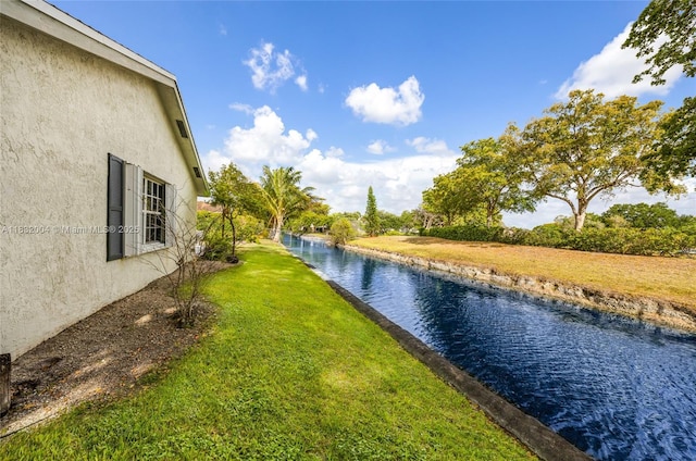 8031 NW 47th Ct, Lauderhill, FL 33351 - view of grassy yard featuring a water view