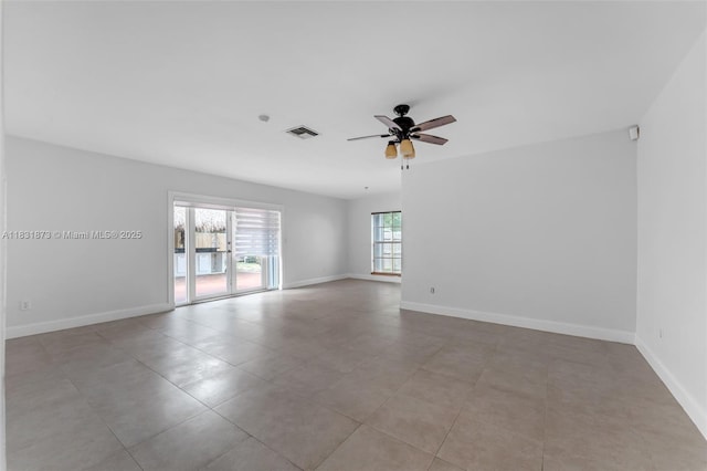 10600 SW 199th St, Cutler Bay, FL 33157 - tiled empty room with a ceiling fan and baseboards