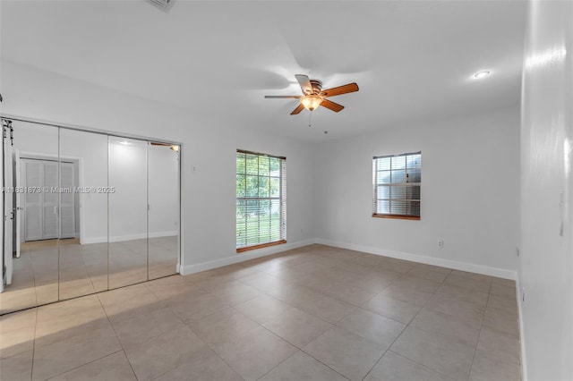 10600 SW 199th St, Cutler Bay, FL 33157 - unfurnished bedroom featuring light tile patterned flooring, ceiling fan, and a closet