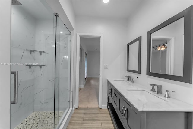 10600 SW 199th St, Cutler Bay, FL 33157 - full bath with a marble finish shower, double vanity, wood tiled floors, and recessed lighting