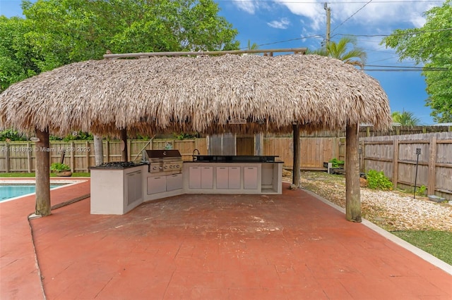 10600 SW 199th St, Cutler Bay, FL 33157 - fenced backyard featuring exterior kitchen, a patio area, and a gazebo
