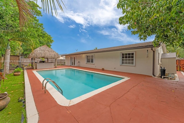 10600 SW 199th St, Cutler Bay, FL 33157 - view of swimming pool featuring a patio area and a fenced backyard