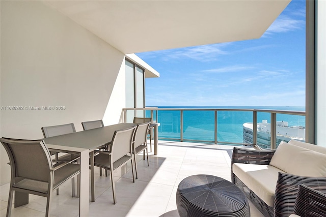 9703 Collins Ave Unit Ph-12, Bal Harbour, FL 33154 - balcony with a water view and outdoor dining area