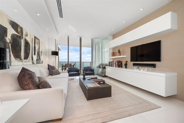 9703 Collins Ave Unit Ph-12, Bal Harbour, FL 33154 - tiled living room with floor to ceiling windows
