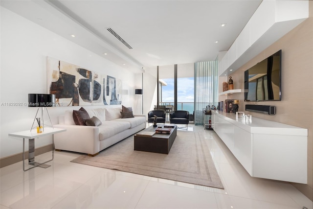 9703 Collins Ave Unit Ph-12, Bal Harbour, FL 33154 - living room featuring a wall of windows, light tile patterned floors, and recessed lighting