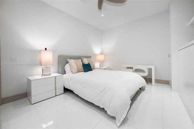 9703 Collins Ave Unit Ph-12, Bal Harbour, FL 33154 - bedroom with light tile patterned floors and ceiling fan