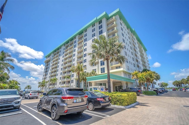 10350 W Bay Harbor Dr Unit 8F, Bay Harbor Islands, FL 33154 - view of apartment building / complex with uncovered parking