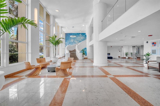 10350 W Bay Harbor Dr Unit 8F, Bay Harbor Islands, FL 33154 - building lobby featuring a high ceiling and recessed lighting