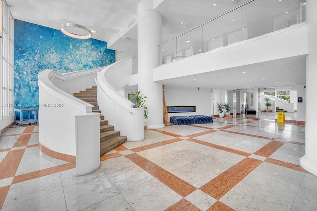 10350 W Bay Harbor Dr Unit 8F, Bay Harbor Islands, FL 33154 - building lobby featuring a high ceiling and recessed lighting