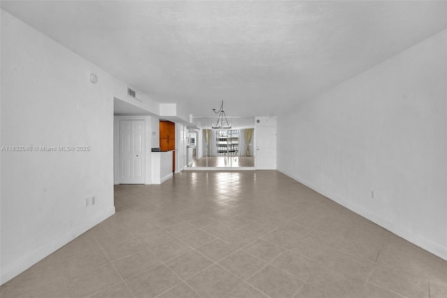 10350 W Bay Harbor Dr Unit 8F, Bay Harbor Islands, FL 33154 - unfurnished living room featuring baseboards