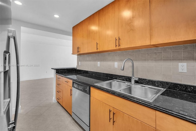 10350 W Bay Harbor Dr Unit 8F, Bay Harbor Islands, FL 33154 - kitchen featuring stainless steel dishwasher, freestanding refrigerator, backsplash, light tile patterned flooring, and dark stone counters