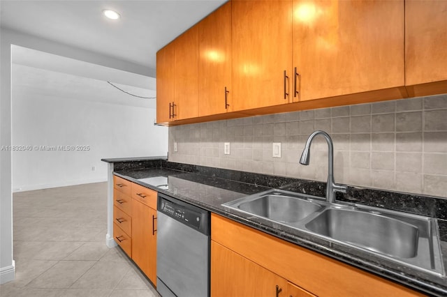 10350 W Bay Harbor Dr Unit 8F, Bay Harbor Islands, FL 33154 - kitchen with stainless steel dishwasher, light tile patterned flooring, tasteful backsplash, dark stone counters, and brown cabinets