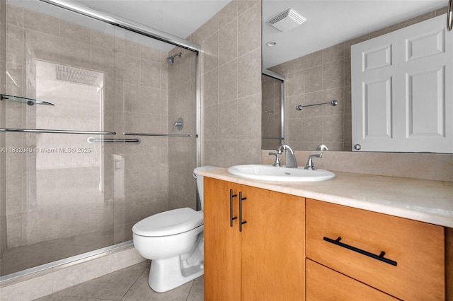 10350 W Bay Harbor Dr Unit 8F, Bay Harbor Islands, FL 33154 - bathroom with tile walls, vanity, a tile shower, and tile patterned floors