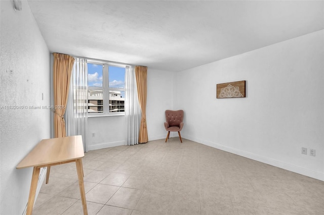 10350 W Bay Harbor Dr Unit 8F, Bay Harbor Islands, FL 33154 - spare room with baseboards