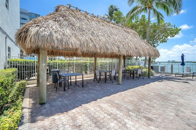 10350 W Bay Harbor Dr Unit 8F, Bay Harbor Islands, FL 33154 - view of community with outdoor dining area and a patio area
