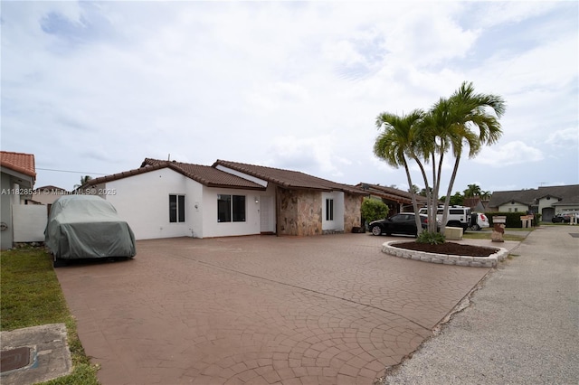 13250 SW 29th Ter, Miami, FL 33175 - view of front of house with a tile roof and stucco siding