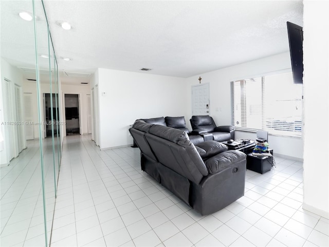 13250 SW 29th Ter, Miami, FL 33175 - living room featuring baseboards and light tile patterned floors