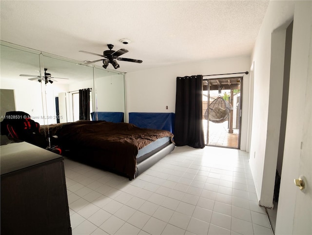 13250 SW 29th Ter, Miami, FL 33175 - bedroom featuring access to outside, light tile patterned floors, a textured ceiling, and ceiling fan