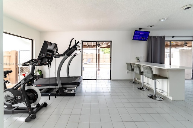 13250 SW 29th Ter, Miami, FL 33175 - exercise area with a textured ceiling and healthy amount of natural light