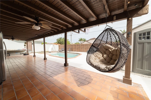 13250 SW 29th Ter, Miami, FL 33175 - fenced backyard with a ceiling fan, a patio, and a storage shed
