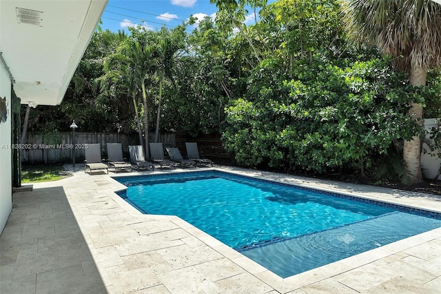 3210 Dover Rd, Pompano Beach, FL 33062 - view of pool with a patio and a fenced backyard