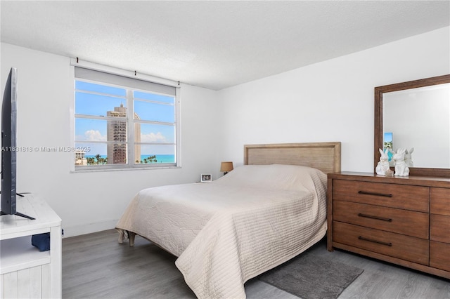 6770 Indian Creek Dr Unit 7A, Miami Beach, FL 33141 - bedroom with light wood finished floors