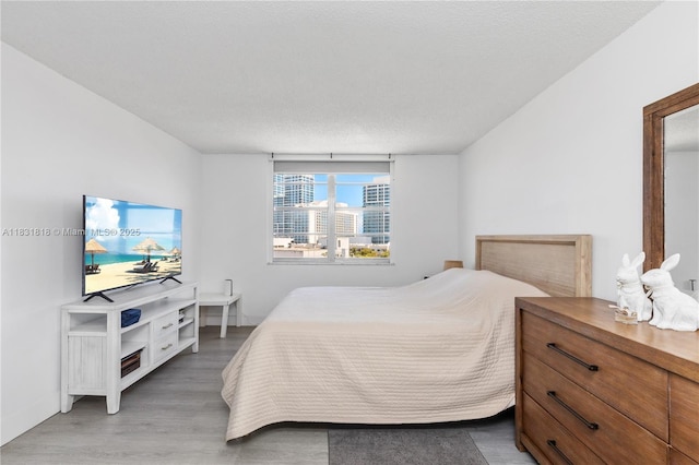 6770 Indian Creek Dr Unit 7A, Miami Beach, FL 33141 - bedroom with wood finished floors