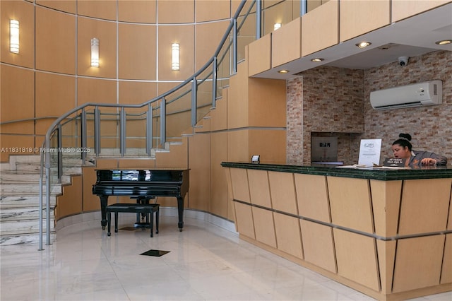 6770 Indian Creek Dr Unit 7A, Miami Beach, FL 33141 - reception with stairs, a high ceiling, and a surveillance system