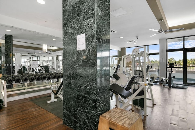 6770 Indian Creek Dr Unit 7A, Miami Beach, FL 33141 - gym with wood finished floors, ceiling fan, floor to ceiling windows, and recessed lighting