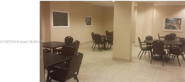 2101 S Ocean Dr Unit 2603, Hollywood, FL 33019 - dining space featuring baseboards and light tile patterned flooring