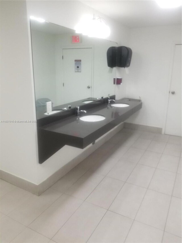 2101 S Ocean Dr Unit 2603, Hollywood, FL 33019 - bathroom featuring double vanity and tile patterned flooring