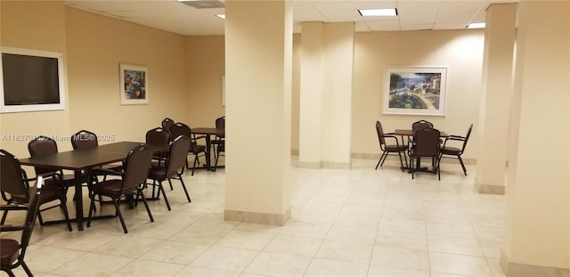 2101 S Ocean Dr Unit 2603, Hollywood, FL 33019 - dining area featuring tile patterned flooring and a drop ceiling